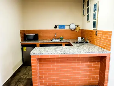 Una cocina o zona de cocina en Yellow breeze loft, Paseo Durango