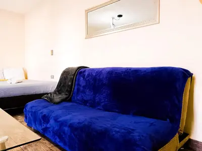 Cama o camas de una habitación en Yellow breeze loft, Paseo Durango
