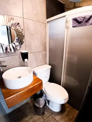 Un baño de Cómoda y acogedora suite, Paseo Durango