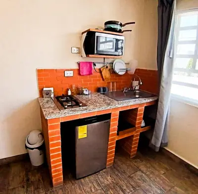 Una cocina o zona de cocina en Suite corcel, Paseo Durango
