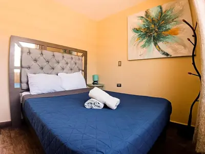 Cama o camas de una habitación en Suite descanso para dos, Paseo Durango