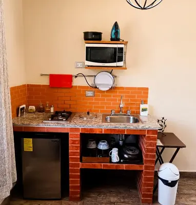 Una cocina o zona de cocina en Suite descanso para dos, Paseo Durango