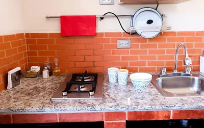 Una cocina o zona de cocina en Suite descanso para dos, Paseo Durango