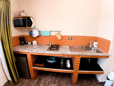 Una cocina o zona de cocina en Suite París, Paseo Durango