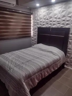Cama o camas de una habitación en Céntrico y accesible