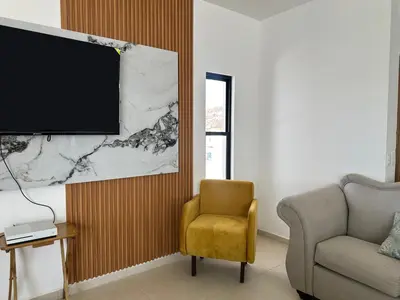 Una televisión o centro de entretenimiento en Casa SOLÉA San Carlos