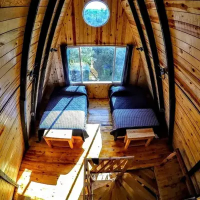 Zona de estar de Black Birds Cabins Creel