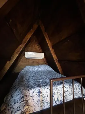 Cama o camas de una habitación en Cabañas El Encanto