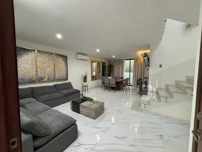 Zona de estar de Casa palmera y sol