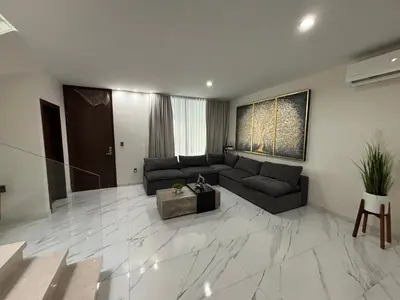 Zona de estar de Casa palmera y sol