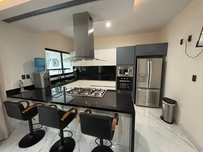 Una cocina o zona de cocina en Casa palmera y sol