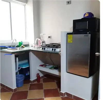 Una cocina o zona de cocina en Edificio Paraiso