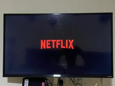 Una televisión o centro de entretenimiento en Edificio Paraiso