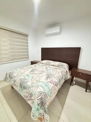 Cama o camas de una habitación en Almarena Residencial