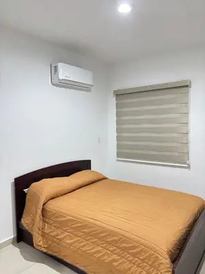 Cama o camas de una habitación en Almarena Residencial