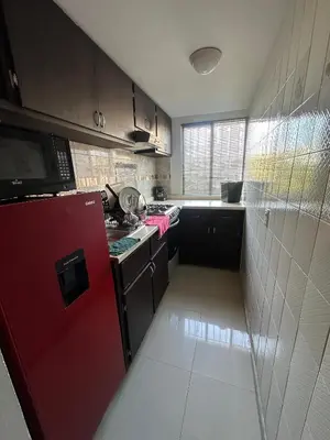 Una cocina o zona de cocina en Departamento a 3 calles del malecon