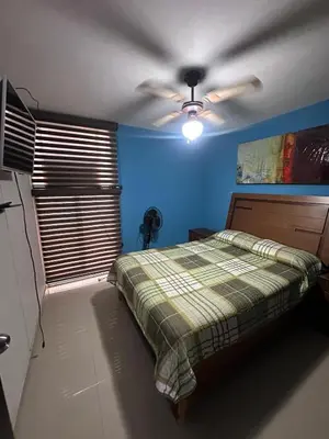 Cama o camas de una habitación en Departamento a 3 calles del malecon