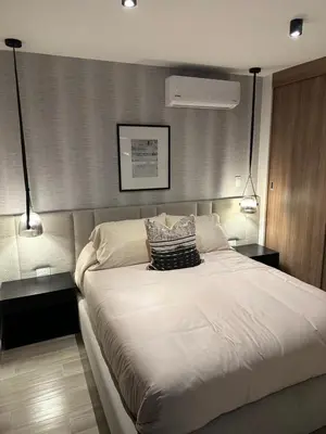 Cama o camas de una habitación en Cómoda y moderna habitación