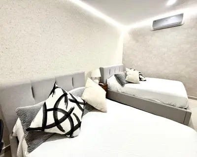 Cama o camas de una habitación en Condominio de Lujo con Impresionante Vista al Mar