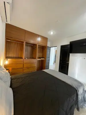 Cama o camas de una habitación en Departamento en playa cerritos