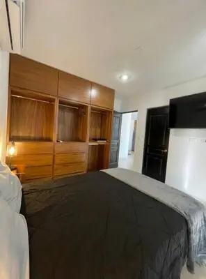 Cama o camas de una habitación en Departamento en playa cerritos