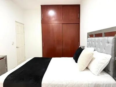 Cama o camas de una habitación en Encanto de Playa Sur By GEstores