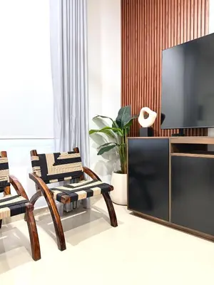 Una televisión o centro de entretenimiento en Encanto de Playa Sur By GEstores