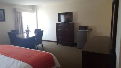 Una televisión o centro de entretenimiento en Hotel Don Ruben