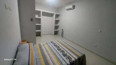 Cama o camas de una habitación en Departmento en Mazatlán