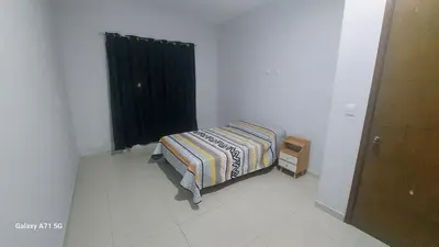 Cama o camas de una habitación en Departmento en Mazatlán