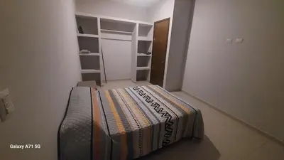 Cama o camas de una habitación en Departmento en Mazatlán
