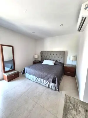 Cama o camas de una habitación en Residencial De Lujo Playas Brujas Alberca y Playa