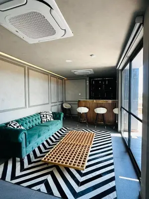 Zona de estar de Loft de lujo a 7minutos El Paso Tx y 17 min Consulado Americano