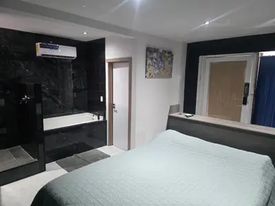 Cama o camas de una habitación en Cataleya Suites Cassandra