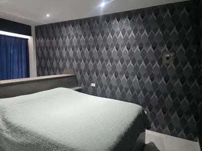 Cama o camas de una habitación en Cataleya Suites Cassandra