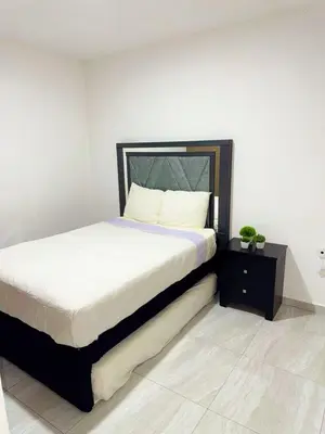 Cama o camas de una habitación en Marina Cerritos - Azul del Mar - 5 Albercas