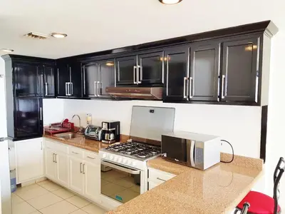 Una cocina o zona de cocina en Miramar Depto de Lujo Frente Playa y Malecón