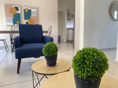Zona de estar de Casa Familiar con Alberca en Privada, 5 min del Aeropuerto y Consulado Americano