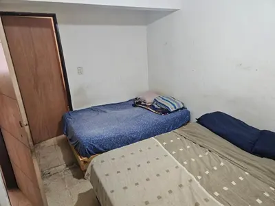 Cama o camas de una habitación en Casa céntrica, segura y sencilla