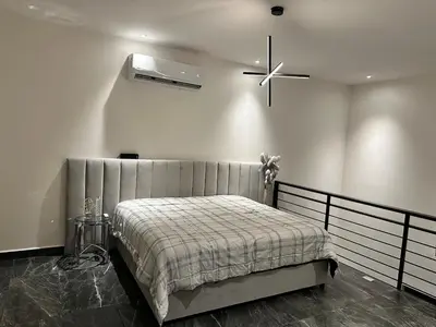 Cama o camas de una habitación en departamento