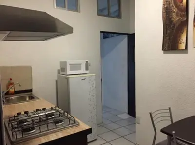 Una cocina o zona de cocina en Centro Histórico Olas Altas