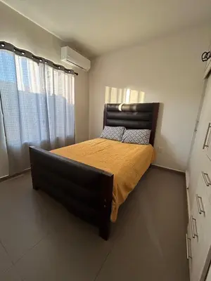 Cama o camas de una habitación en Apartamento en Zona Playa Cerritos