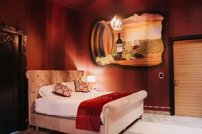 Cama o camas de una habitación en EXCLUSIVE 1598 Hotel Boutique