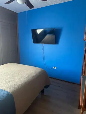 Cama o camas de una habitación en Casa cerca del Consulado Americano Cs