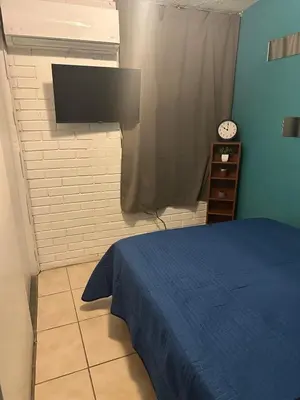 Cama o camas de una habitación en House by American Consulate Cd