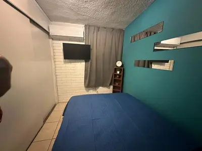 Cama o camas de una habitación en House by American Consulate Cd