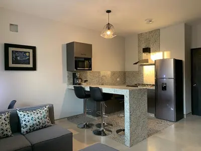 Una cocina o zona de cocina en Casa Banak Apartments