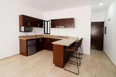 Una cocina o zona de cocina en Apartamento familiar a pasos de la playa