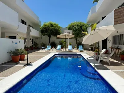 Piscina en o cerca de Loft a 6 minutos de la Playa