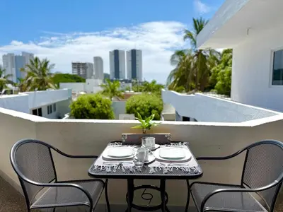 Un balcón o terraza de Suite en el corazón de la Zona Dorada